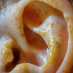 Cérumen : causes, conséquences et solutions pour traiter efficacement les bouchons d'oreille